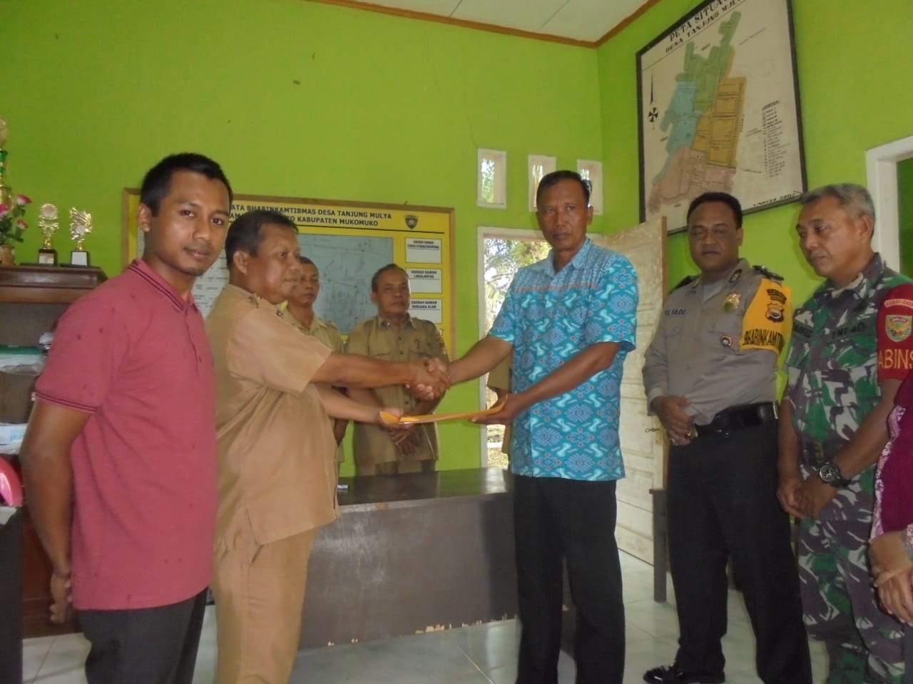 Serah terima realisasi pekerjaan Dana Desa tahun 2019 dari TPK Desa ke Masyarakat Desa dan pihak Kecamatan.